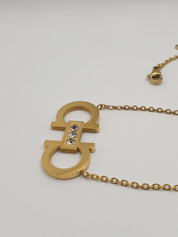 collier boucles acier Omega , sur moderne-bijoux.fr - Bijoux ethniques & Femmes du monde