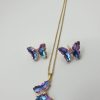 Collier & boucles en acier papillon , sur moderne-bijoux.fr - Bijoux ethniques & Femmes du monde